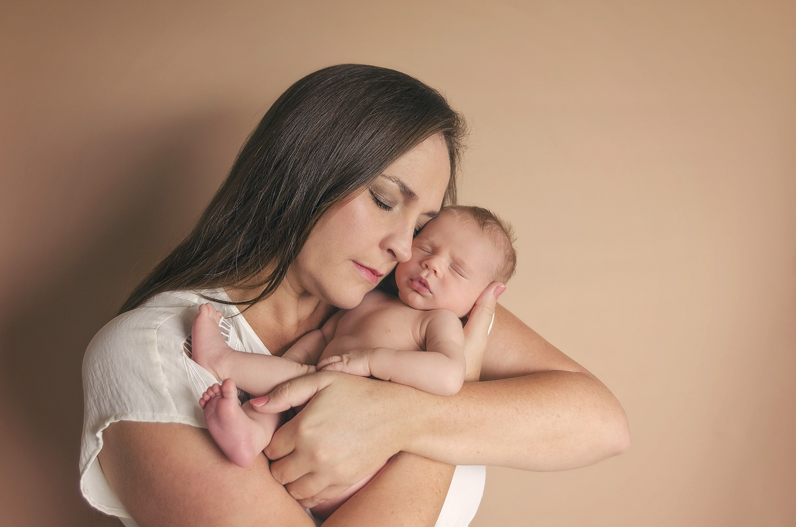 Jessie Lee Photography Newborn Photographer Pompano Beach South Florida mother holding newborn baby boy